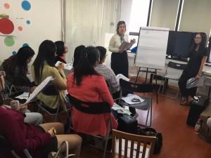 Denise Challis trains clinicians to use the GMDS-ER at LIH Olivia's Place in Shanghai.