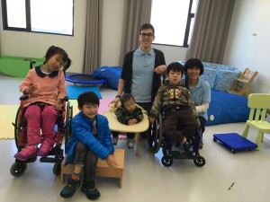Marc Innerfhofer (PT) and Eva Ma (OT) with children from Shepherd's Field at LIH Olivia's Place Beijing