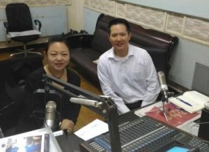 Nelson Chow, CEO of LIH Healthcare, broadcasts at Yunnan News Radio Station.